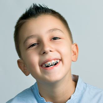 Preteen boy receiving pediatric orthodontics