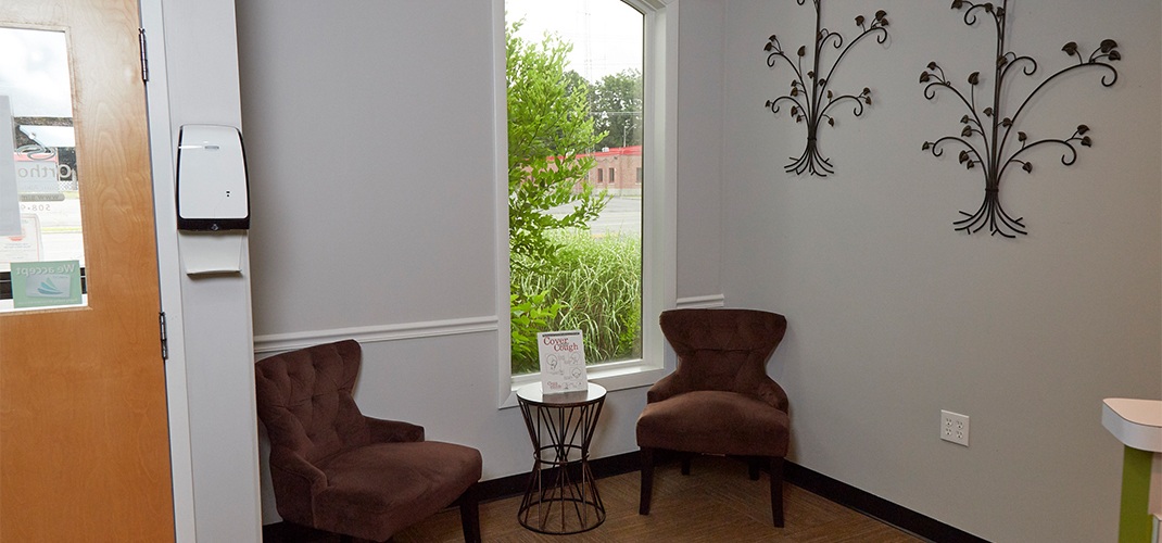 Comfortable chairs in orthodontic office waiting room