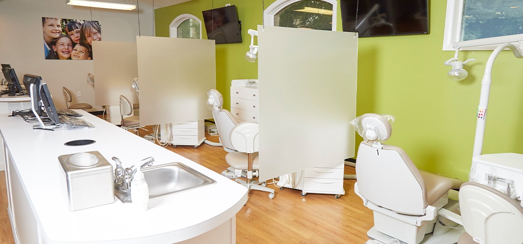 Row of orthodontic treatment chairs